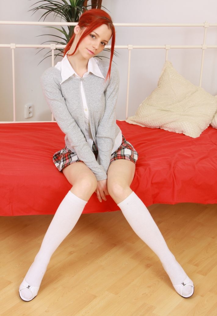 Redhead Schoolgirl wearing White Short Socks and Red and White Tartan Miniskirt